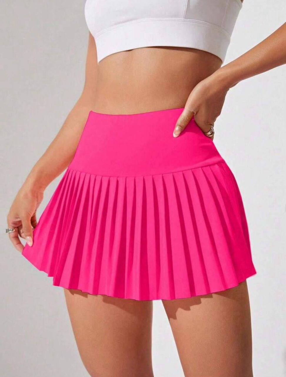 Falda con pliegues
