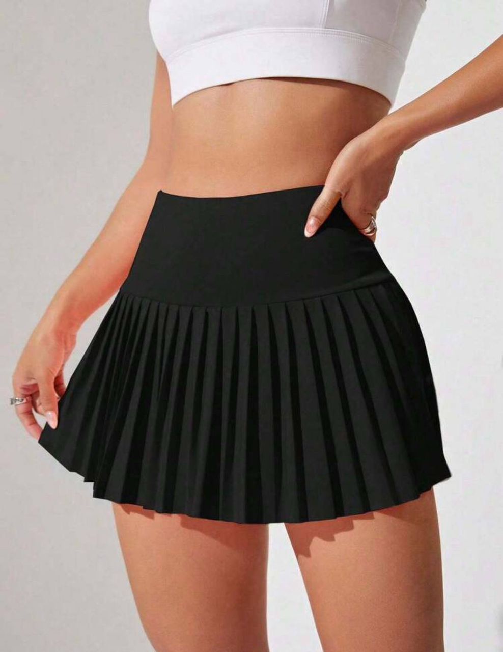Falda con pliegues