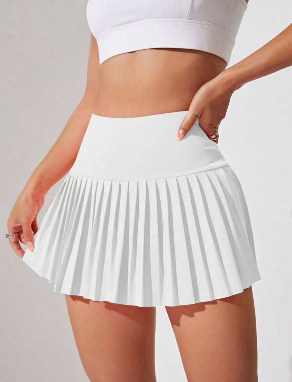 Falda con pliegues