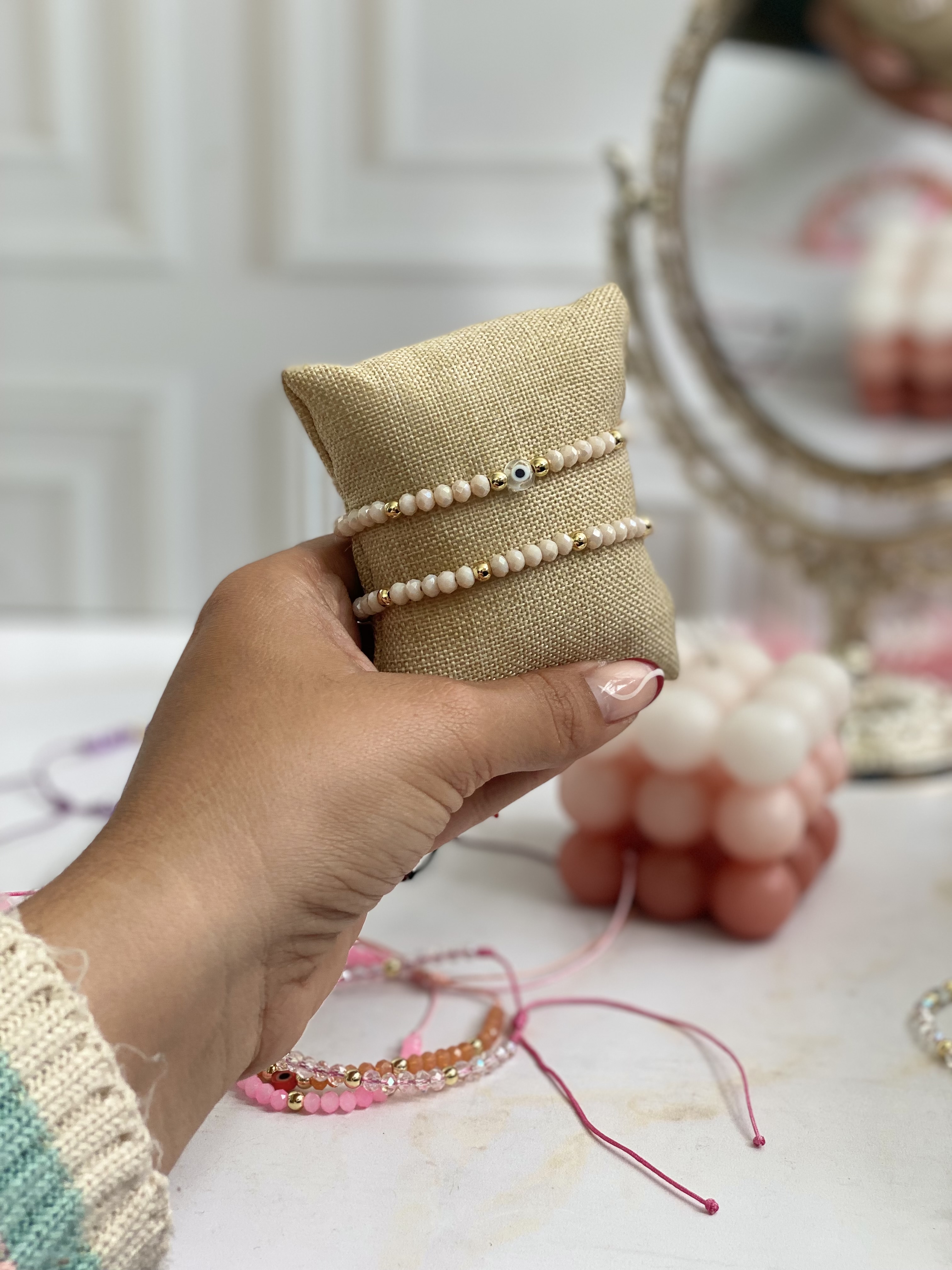 Par de pulseras cristal y ojito 11