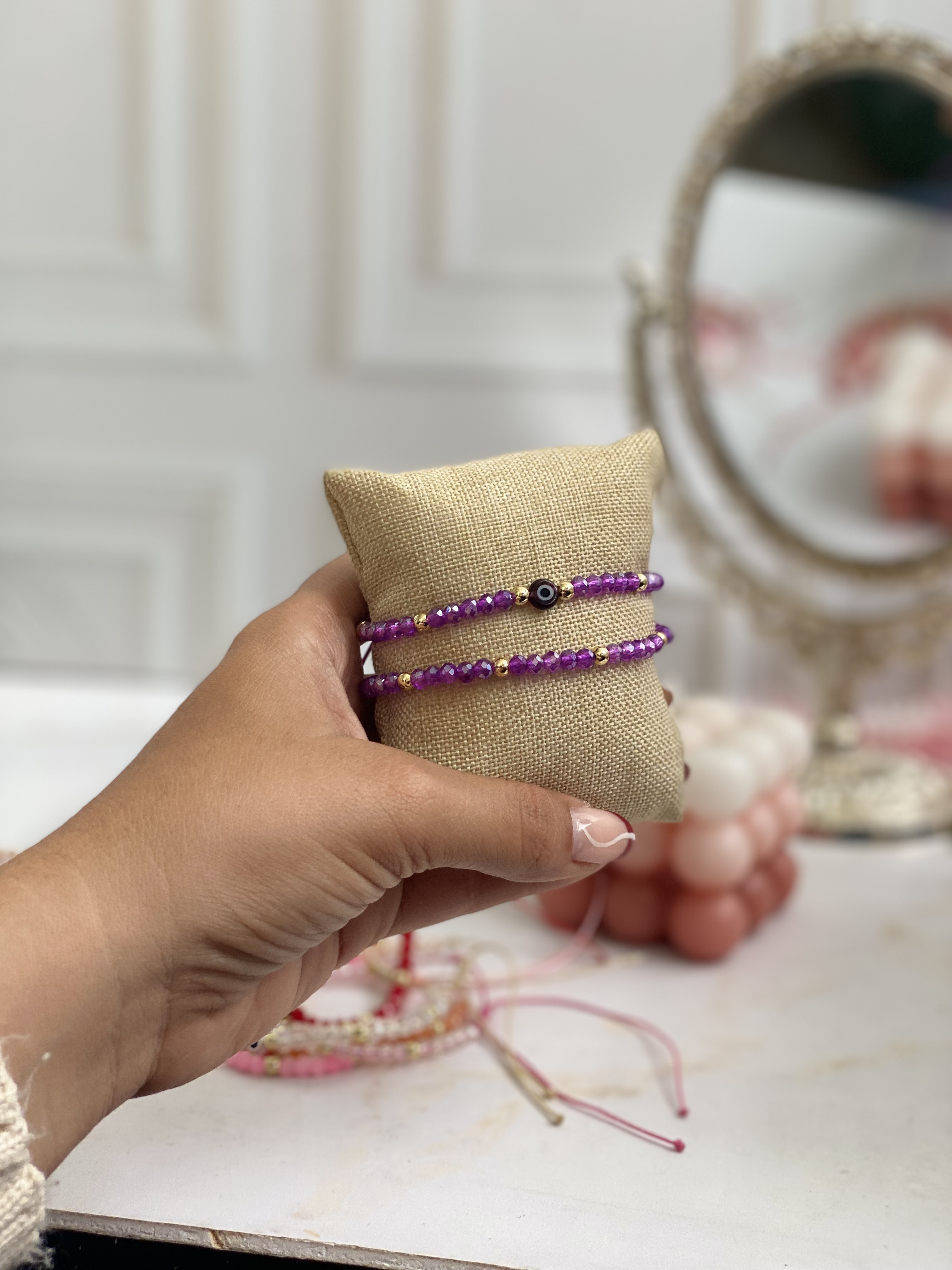 Par de pulseras cristal y ojito 6