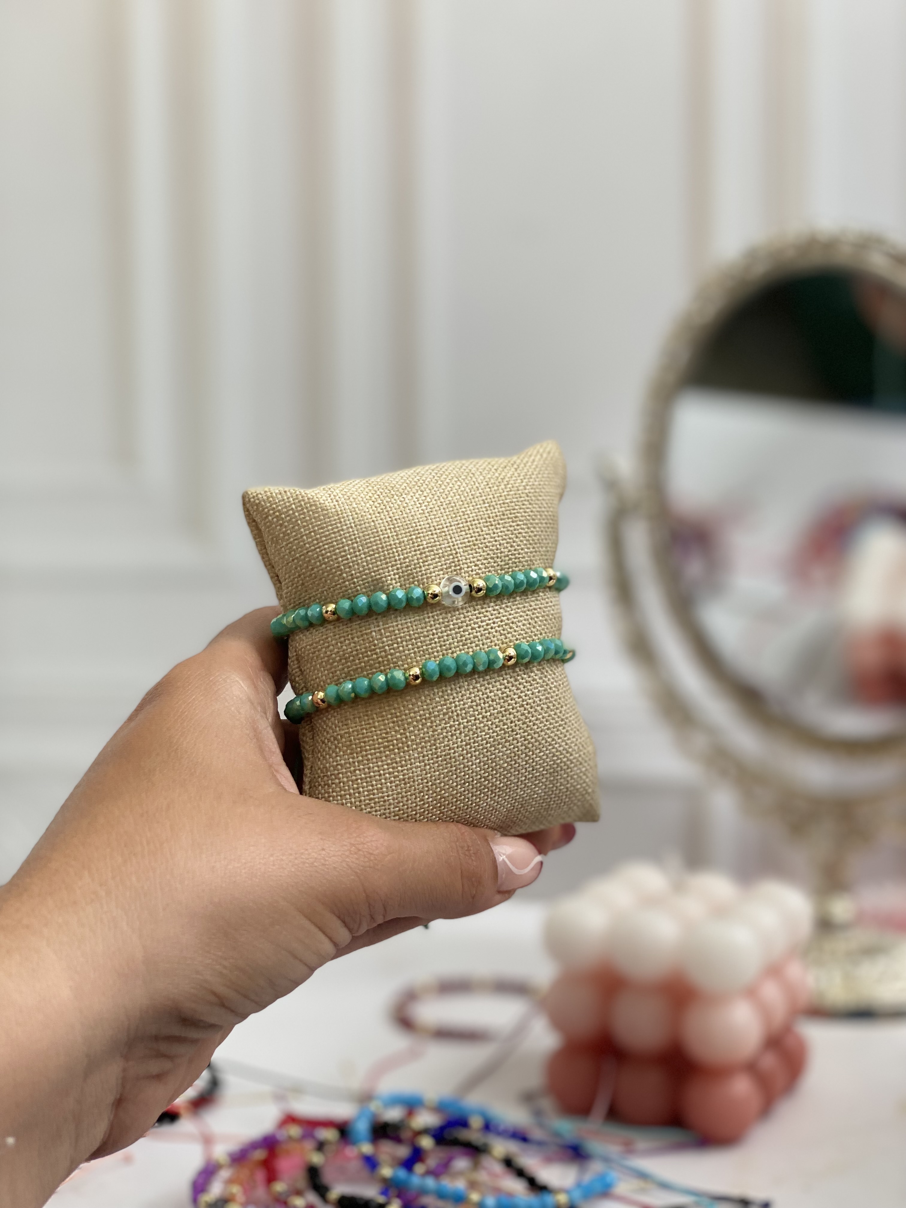 Par de pulseras cristal y ojito 8