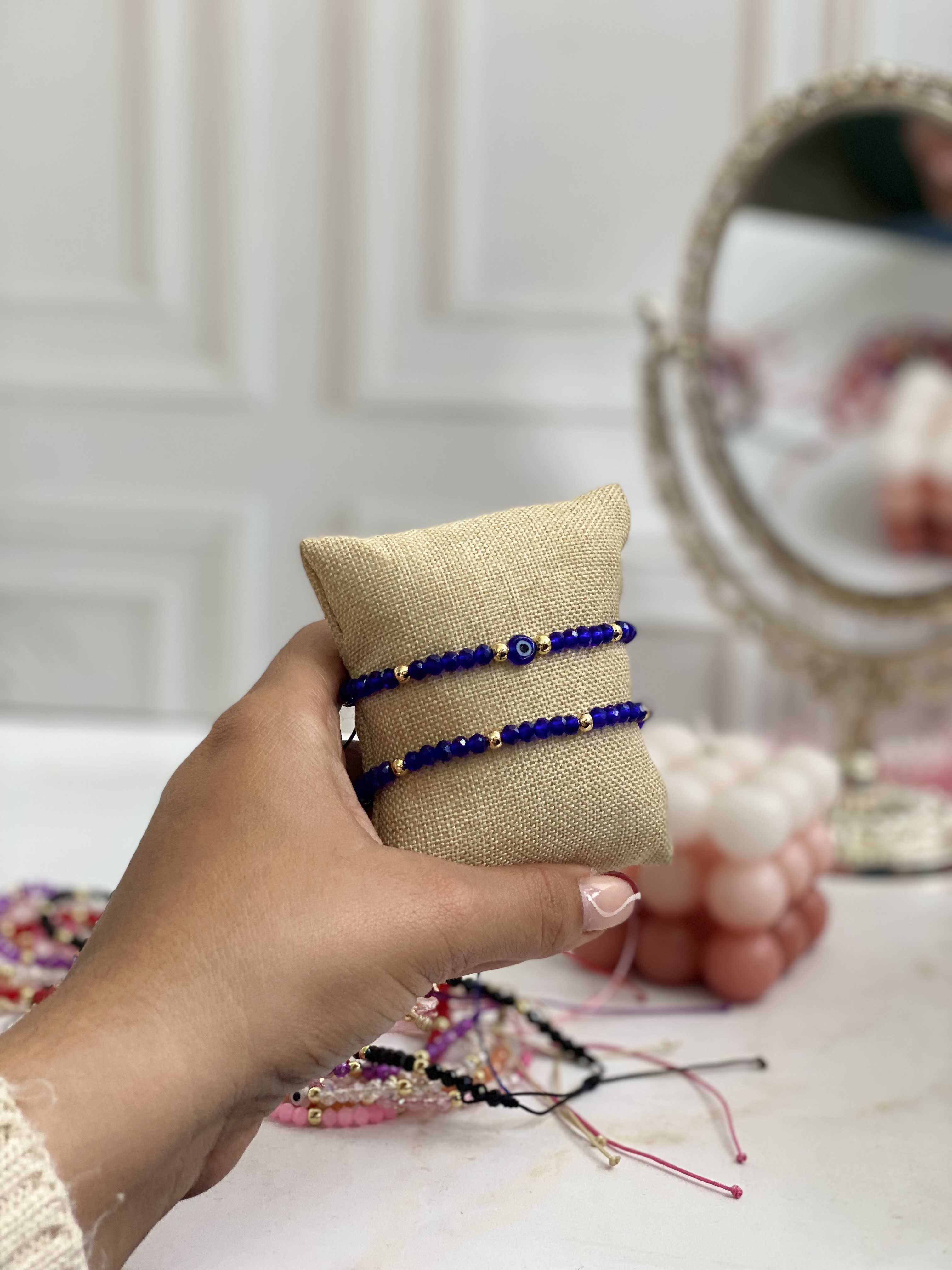 Par de pulseras cristal y ojito 9